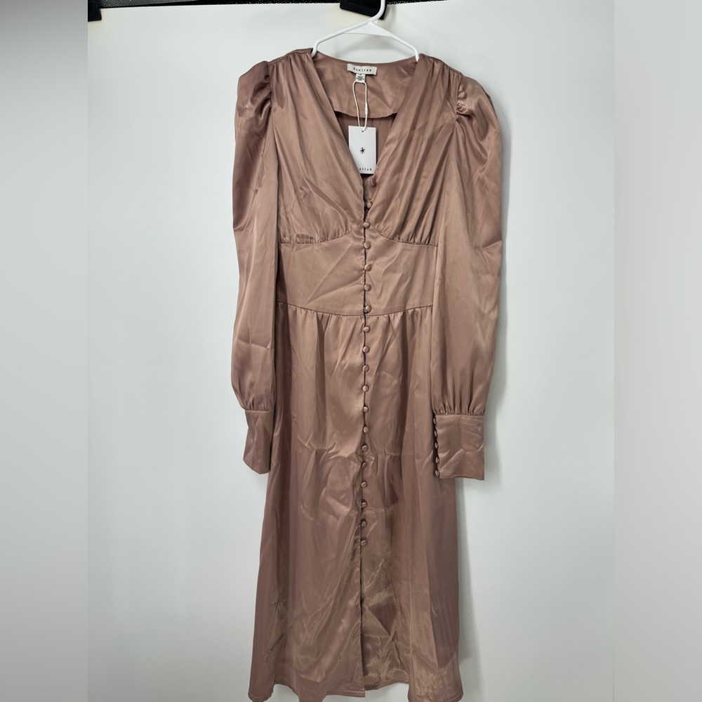 Brand new, has tag. Bought too small for me. Blush color. Size medium.